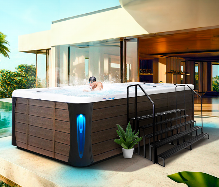 Calspas hot tub being used in a family setting - Cary